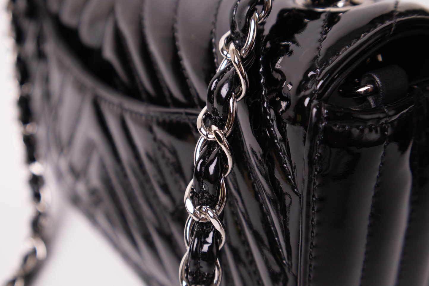 PATENT CALFSKIN CHEVRON QUILTED MINI FLAP BLACK